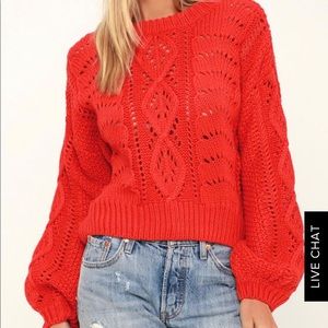 Red cable knit sweater
